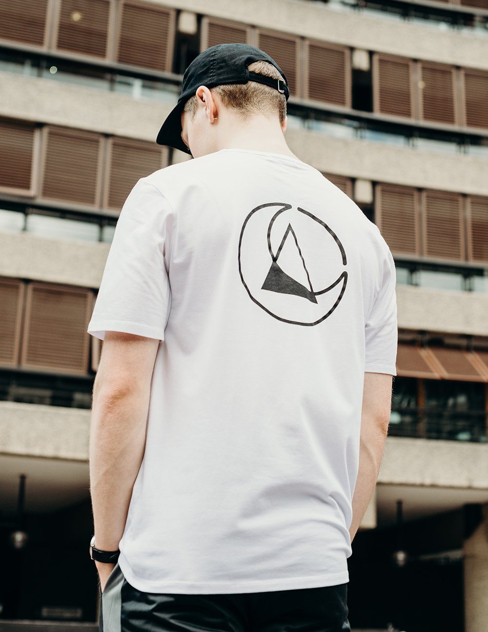 unisex white branded t-shirt handmade using organic cotton by ethical gender neutral streetwear brand Androgyny UK