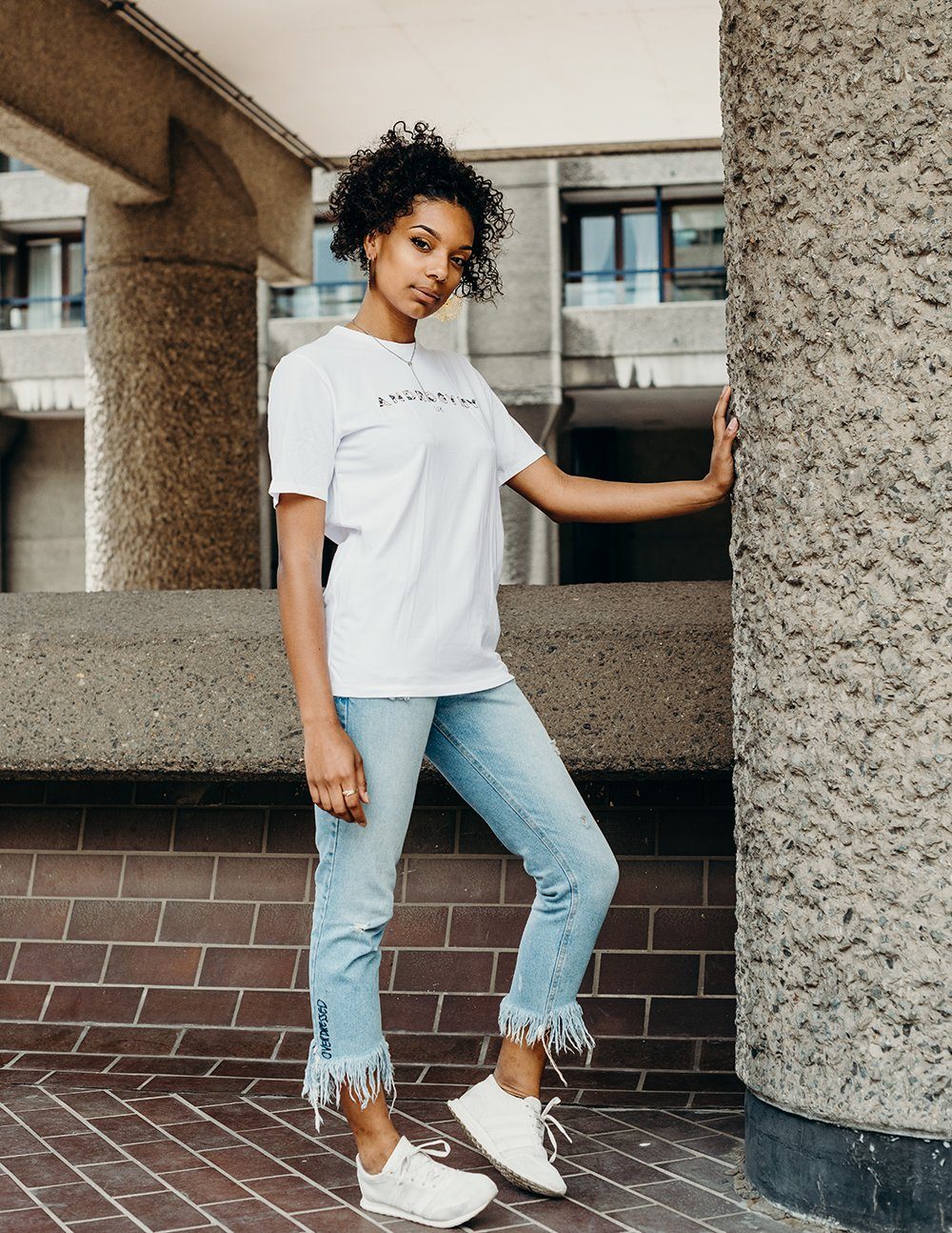 unisex white branded t-shirt handmade using organic cotton by ethical gender neutral streetwear brand Androgyny UK