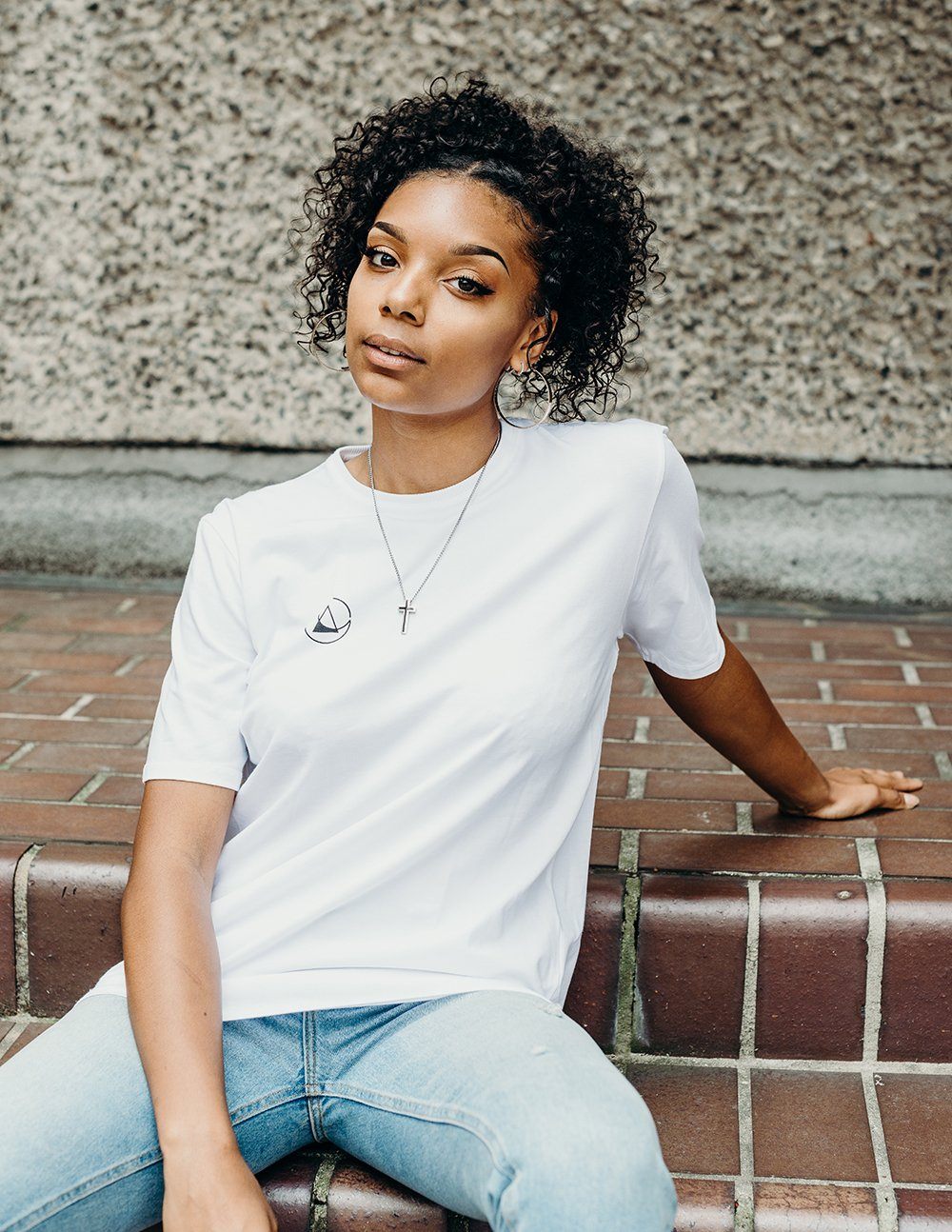 unisex white branded t-shirt handmade using organic cotton by ethical gender neutral streetwear brand Androgyny UK