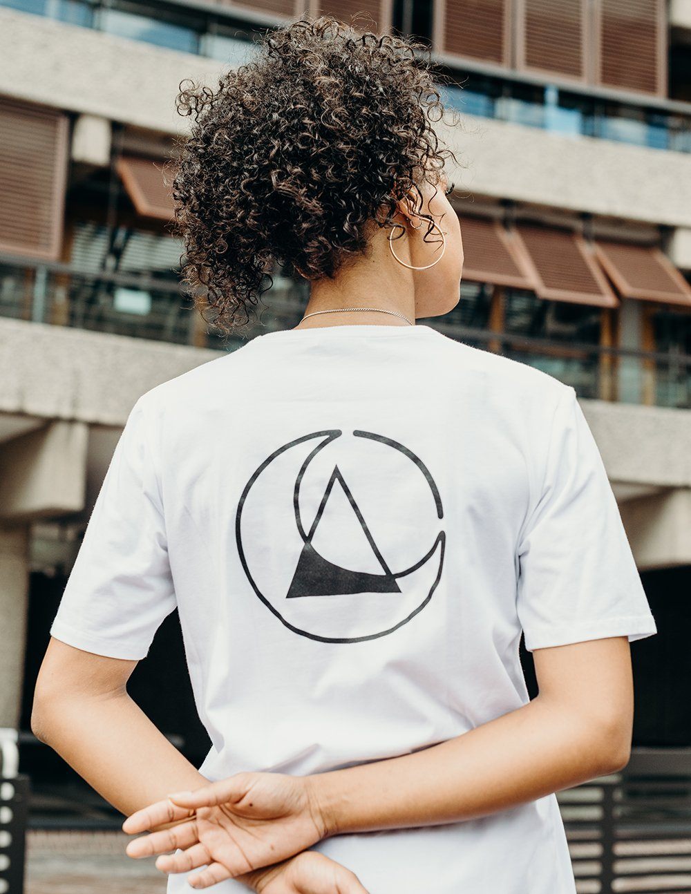 unisex white branded t-shirt handmade using organic cotton by ethical gender neutral streetwear brand Androgyny UK